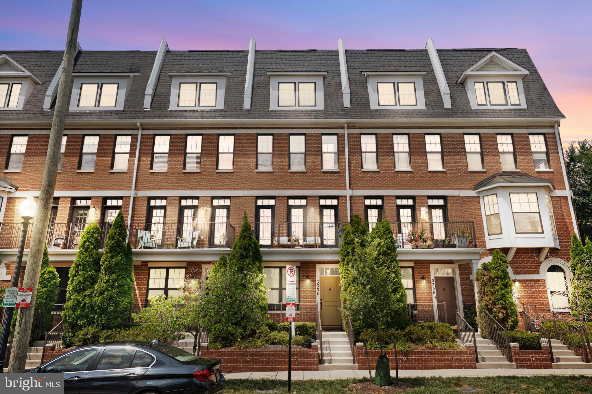3334 7th Street Northeast Washington, DC 20017 - Photo 2 of 38 a front view of a residential apartment building with a yard