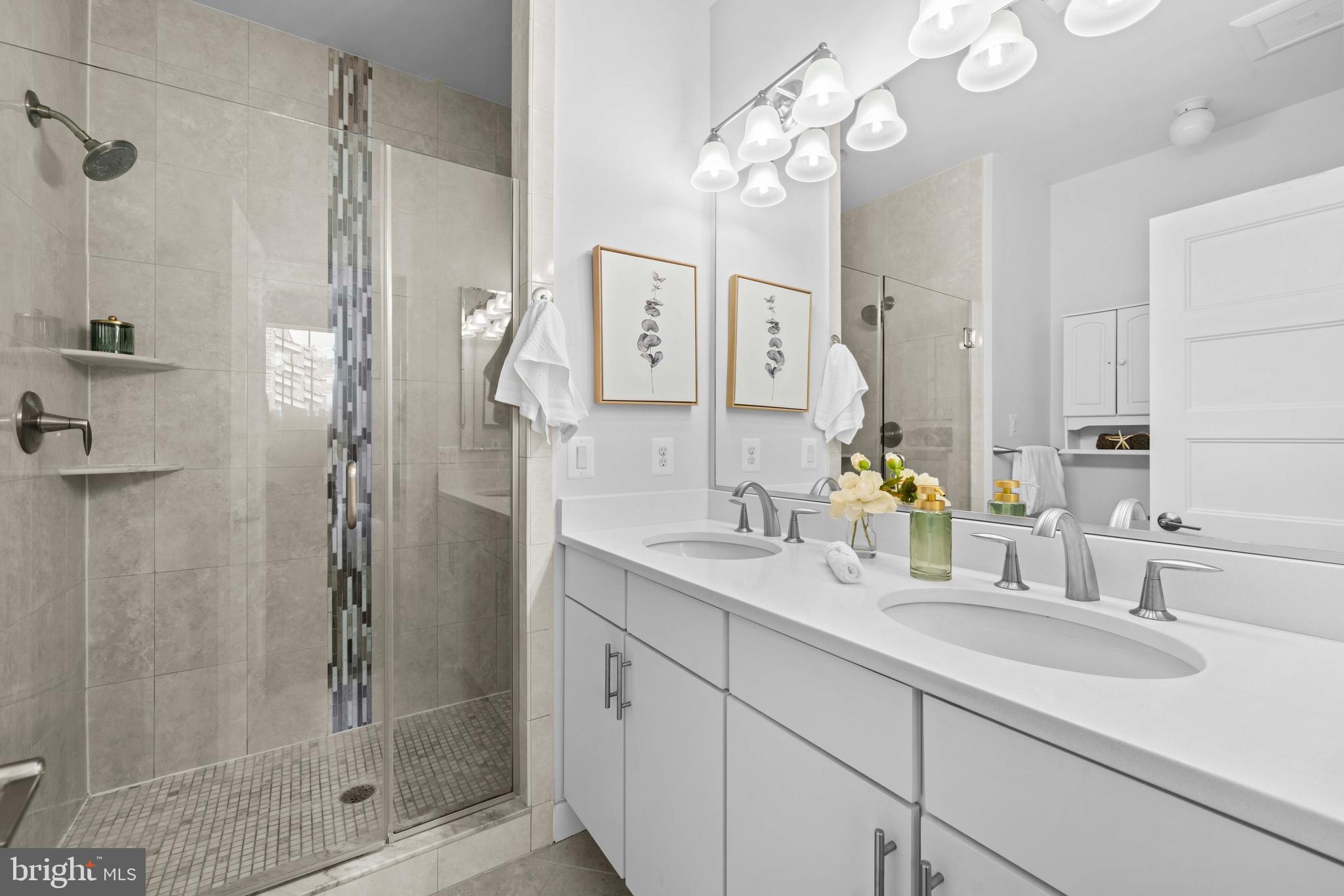 3334 7th Street Northeast Washington, DC 20017 - Photo 23 of 38 a bathroom with a shower sink and mirror