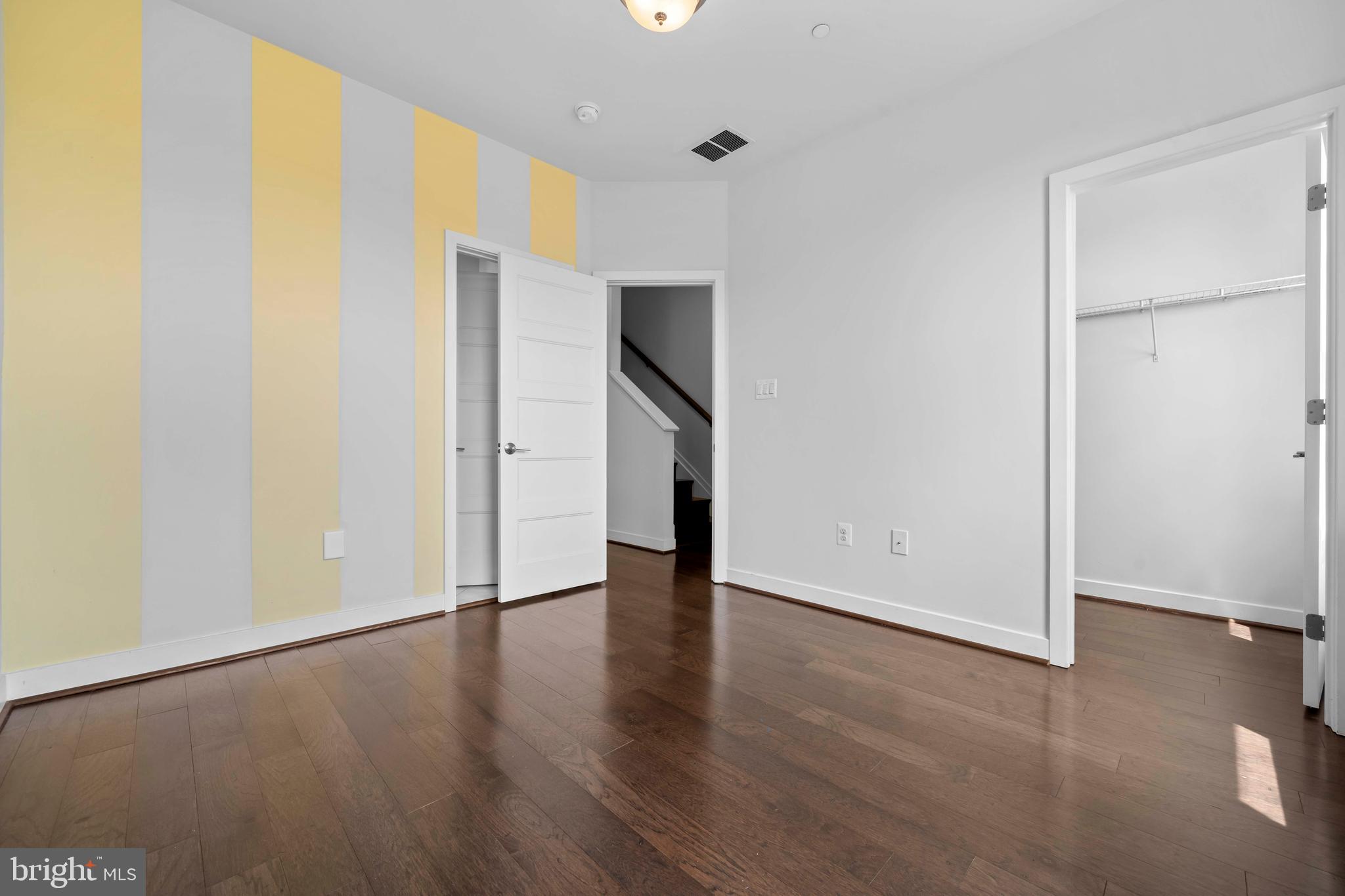3334 7th Street Northeast Washington, DC 20017 - Photo 26 of 38 an empty room with wooden floor and windows