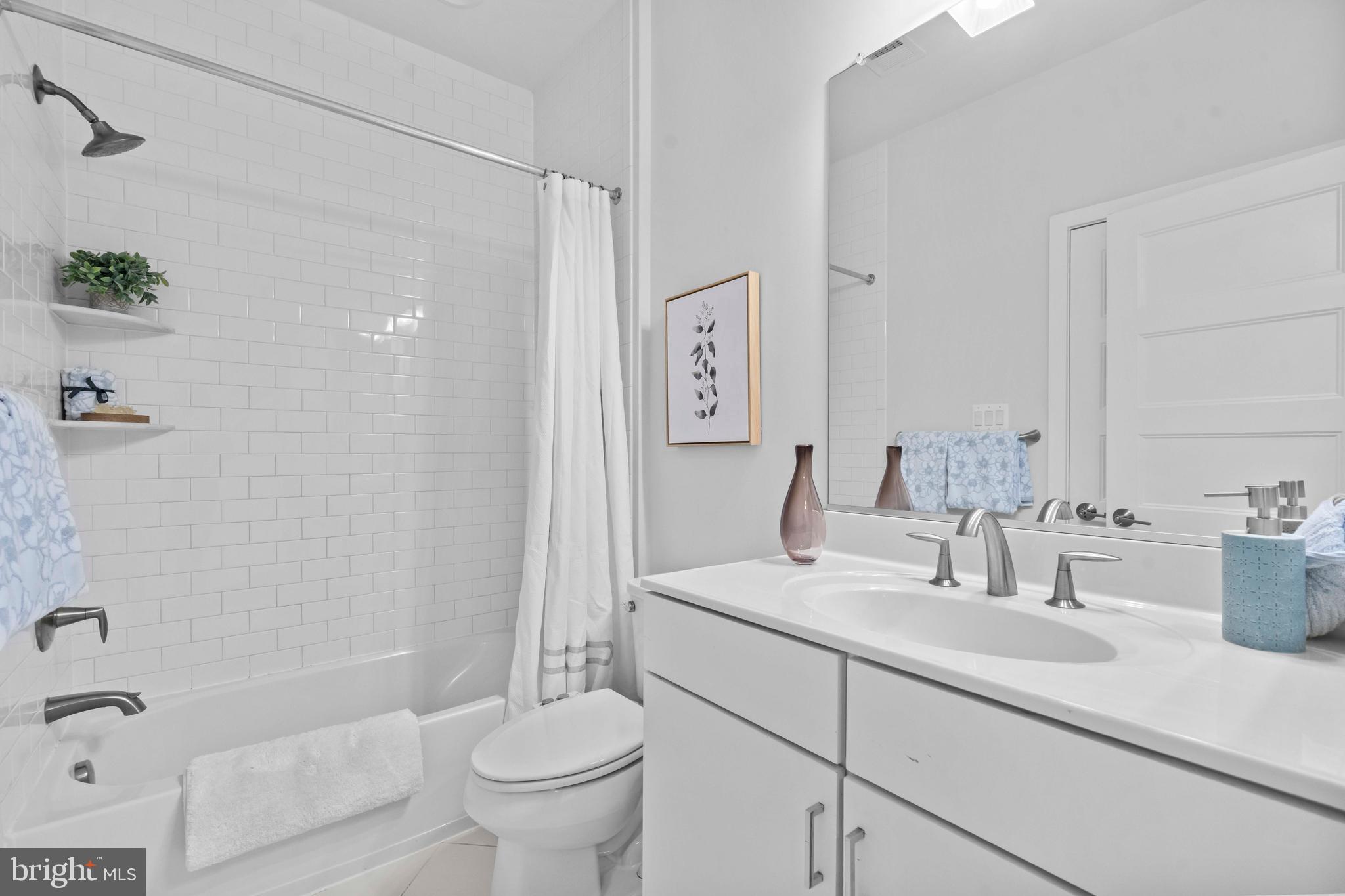 3334 7th Street Northeast Washington, DC 20017 - Photo 27 of 38 a bathroom with a sink toilet and shower