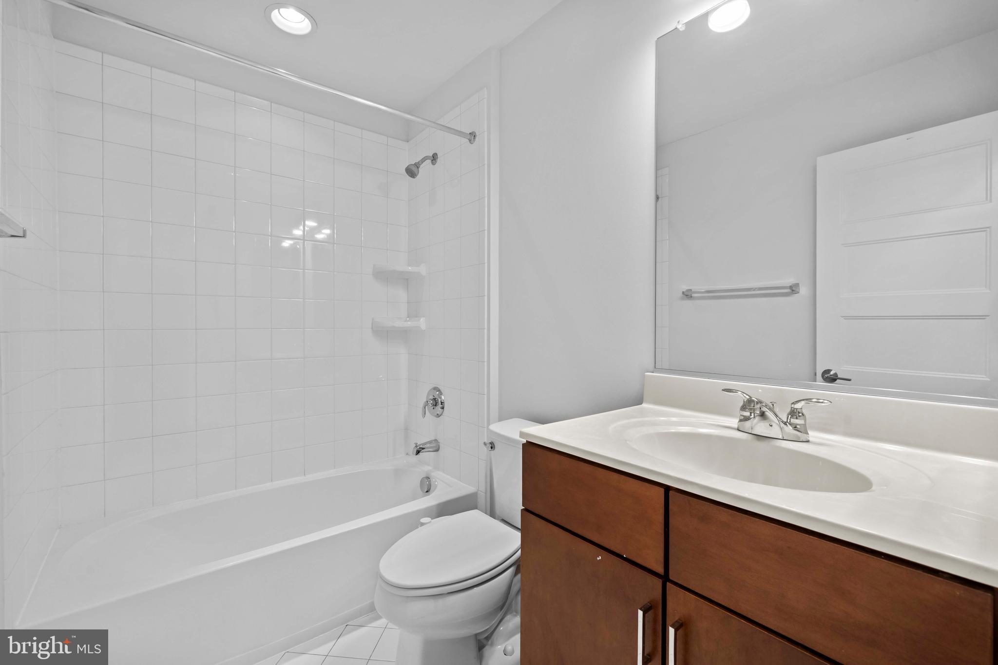 3334 7th Street Northeast Washington, DC 20017 - Photo 29 of 38 a bathroom with a sink toilet and shower