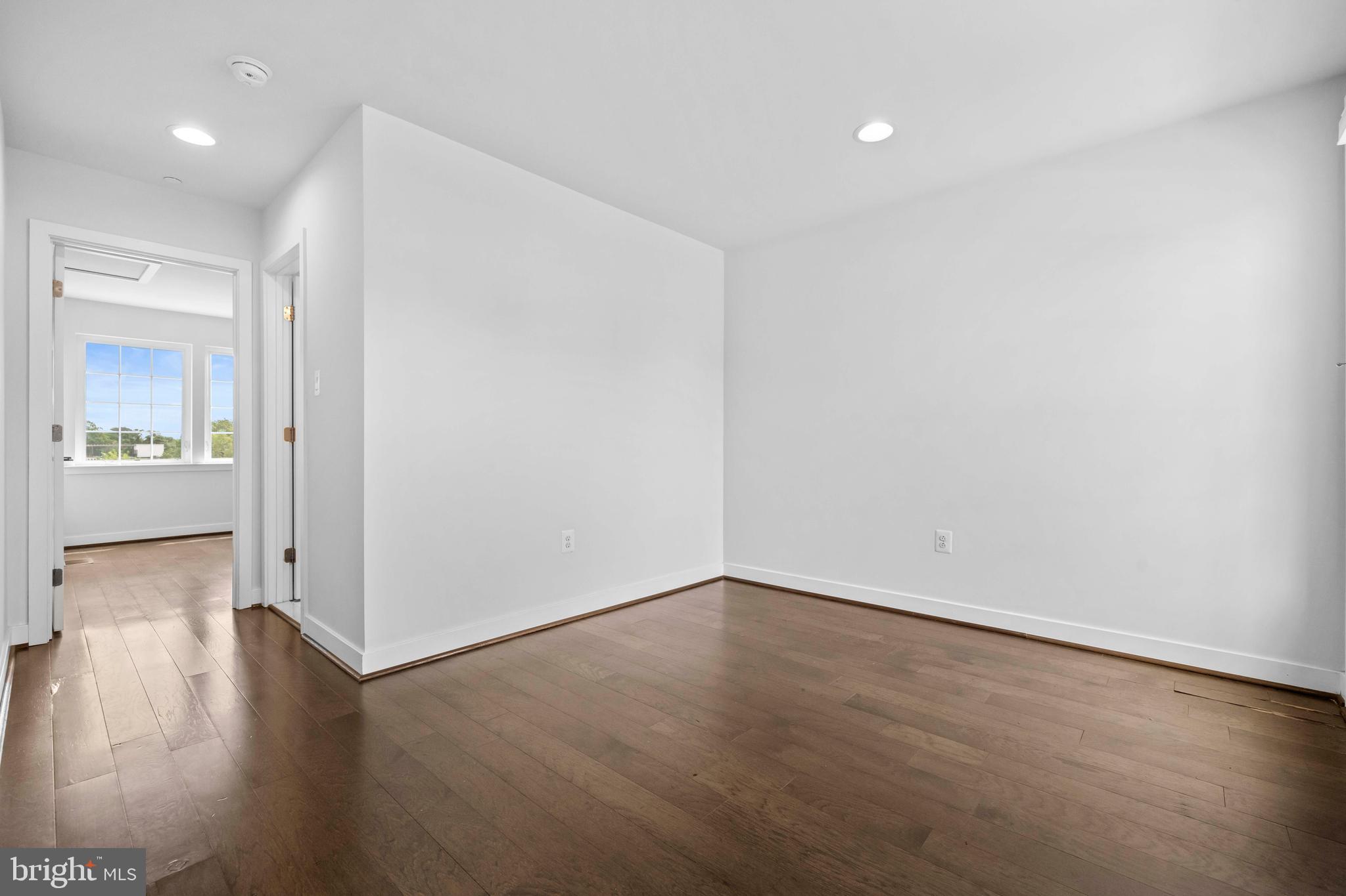 3334 7th Street Northeast Washington, DC 20017 - Photo 33 of 38 an empty room with wooden floor & windows