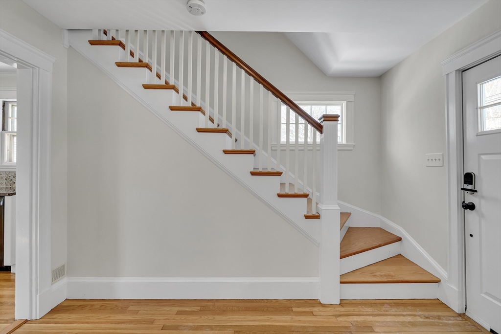 10 Dexter Road Lexington, MA 02420 - Photo 2 of 35 a view of entryway and hall with wooden floor