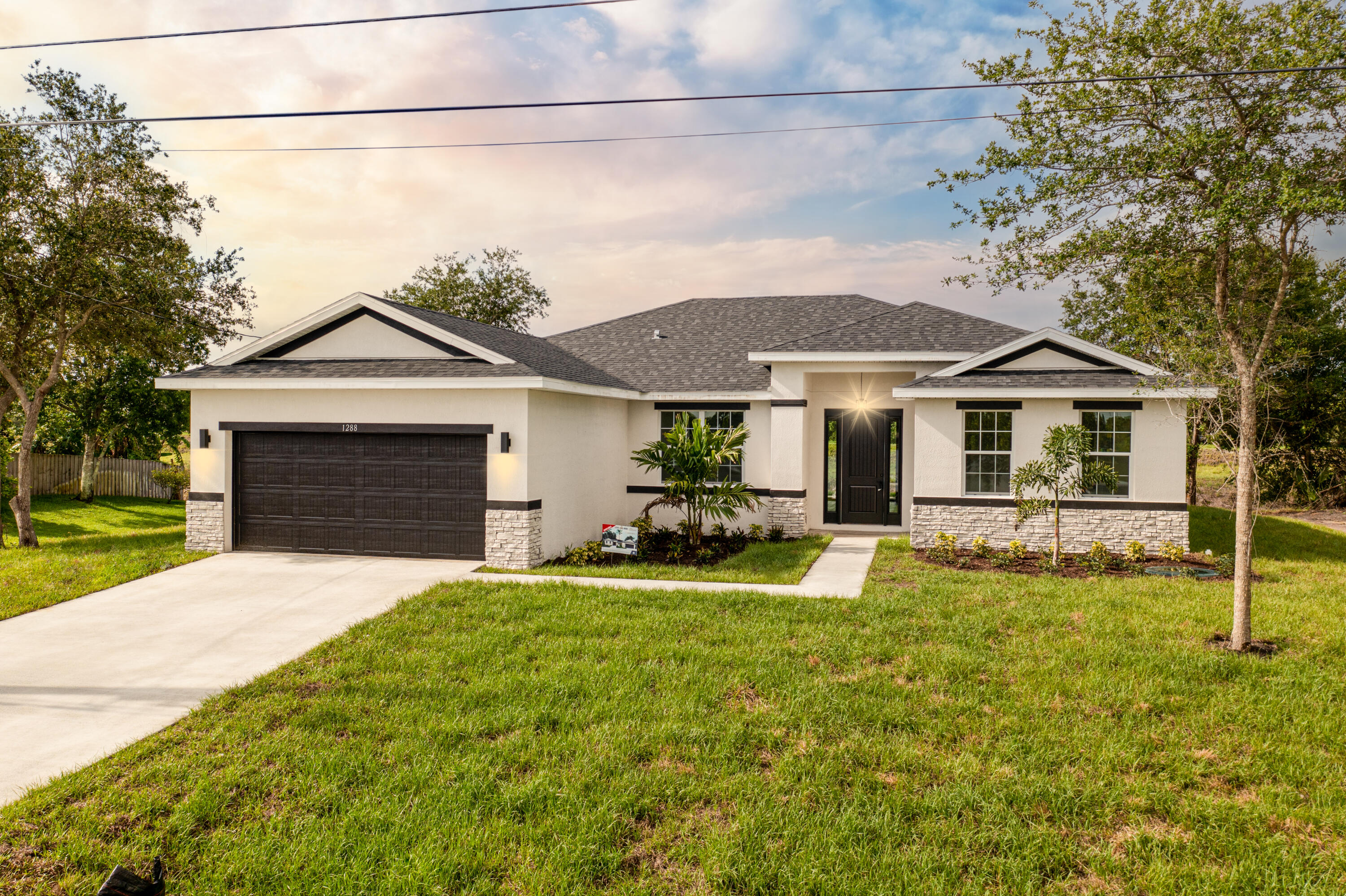 2613 Southwest Fair Isle Road Port St. Lucie, FL 34987 - Photo 1 of 1 exterior of same model different locatio