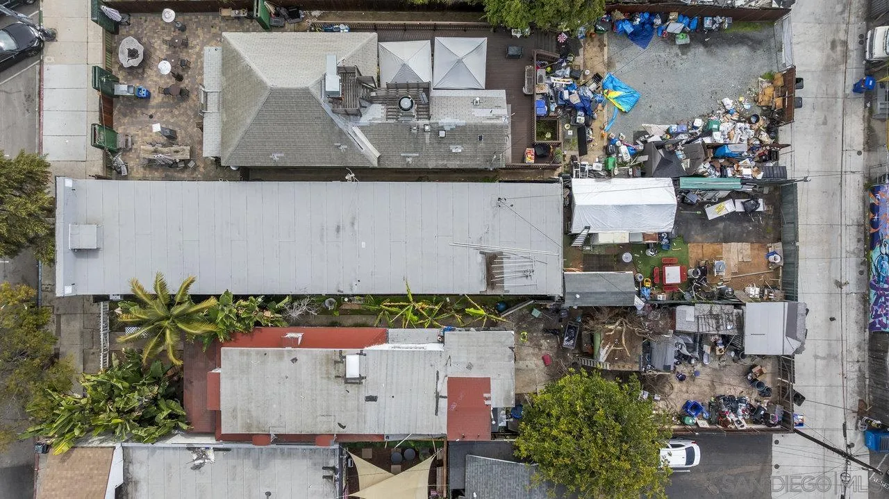 2215 Logan Avenue San Diego, CA 92113 - Photo 7 of 17 an aerial view of a houses with outdoor space