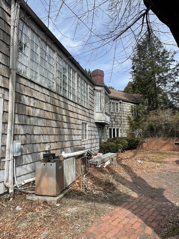 53 Crestview Road Belmont, MA 02478 - Photo 7 of 8 a backyard of a house with seating space