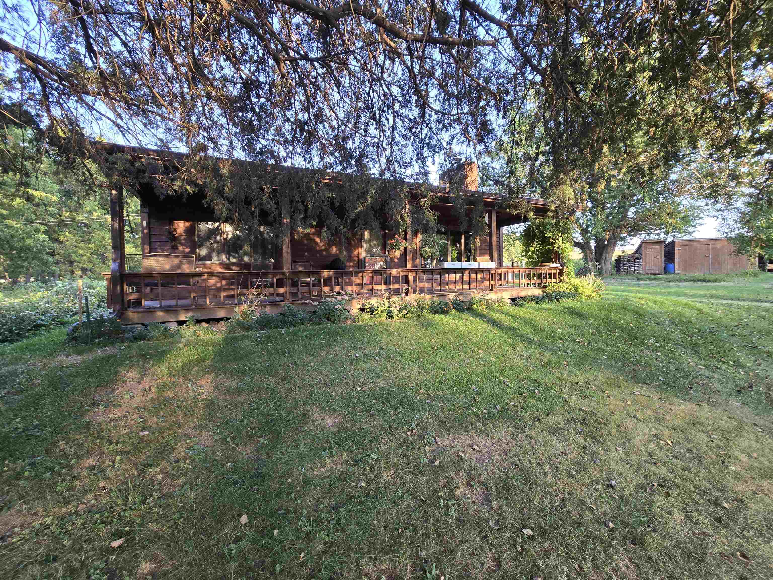17065 Highway 64 Polo, IL 61064 - Photo 2 of 26 a view of a house with backyard and sitting area