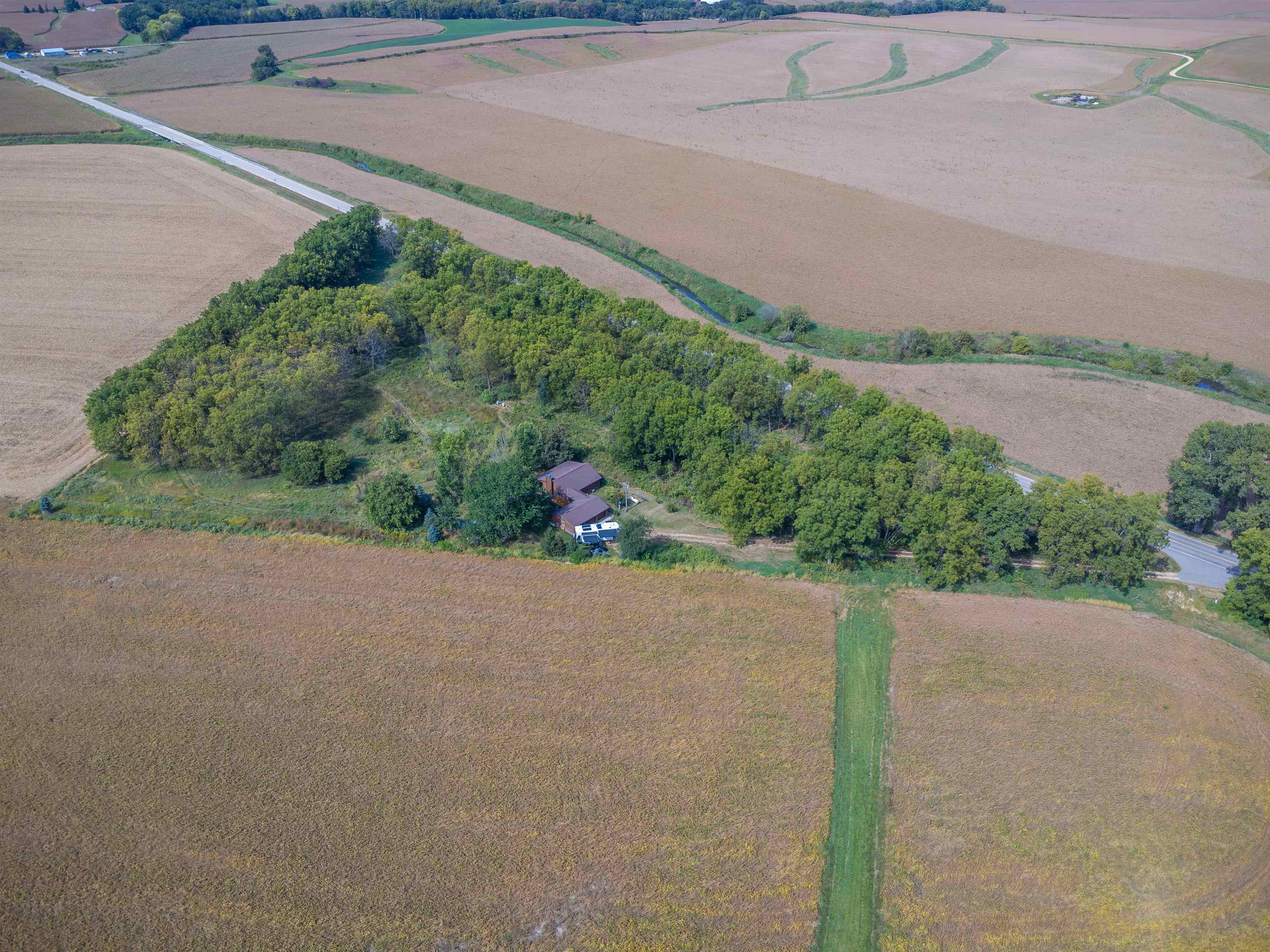 17065 Highway 64 Polo, IL 61064 - Photo 26 of 26 a view of a plants and trees in the background