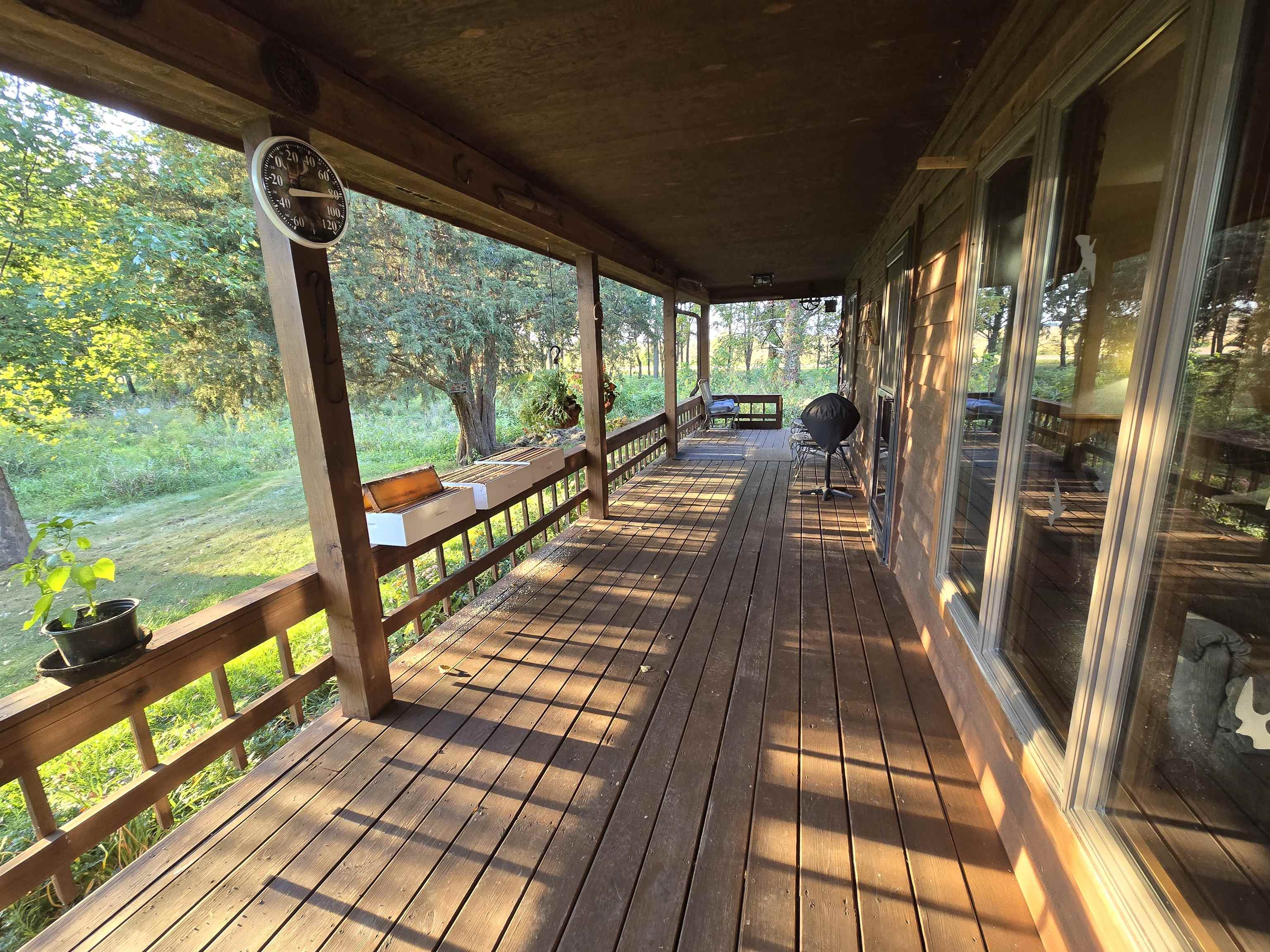 17065 Highway 64 Polo, IL 61064 - Photo 7 of 26 a view of balcony with wooden floor