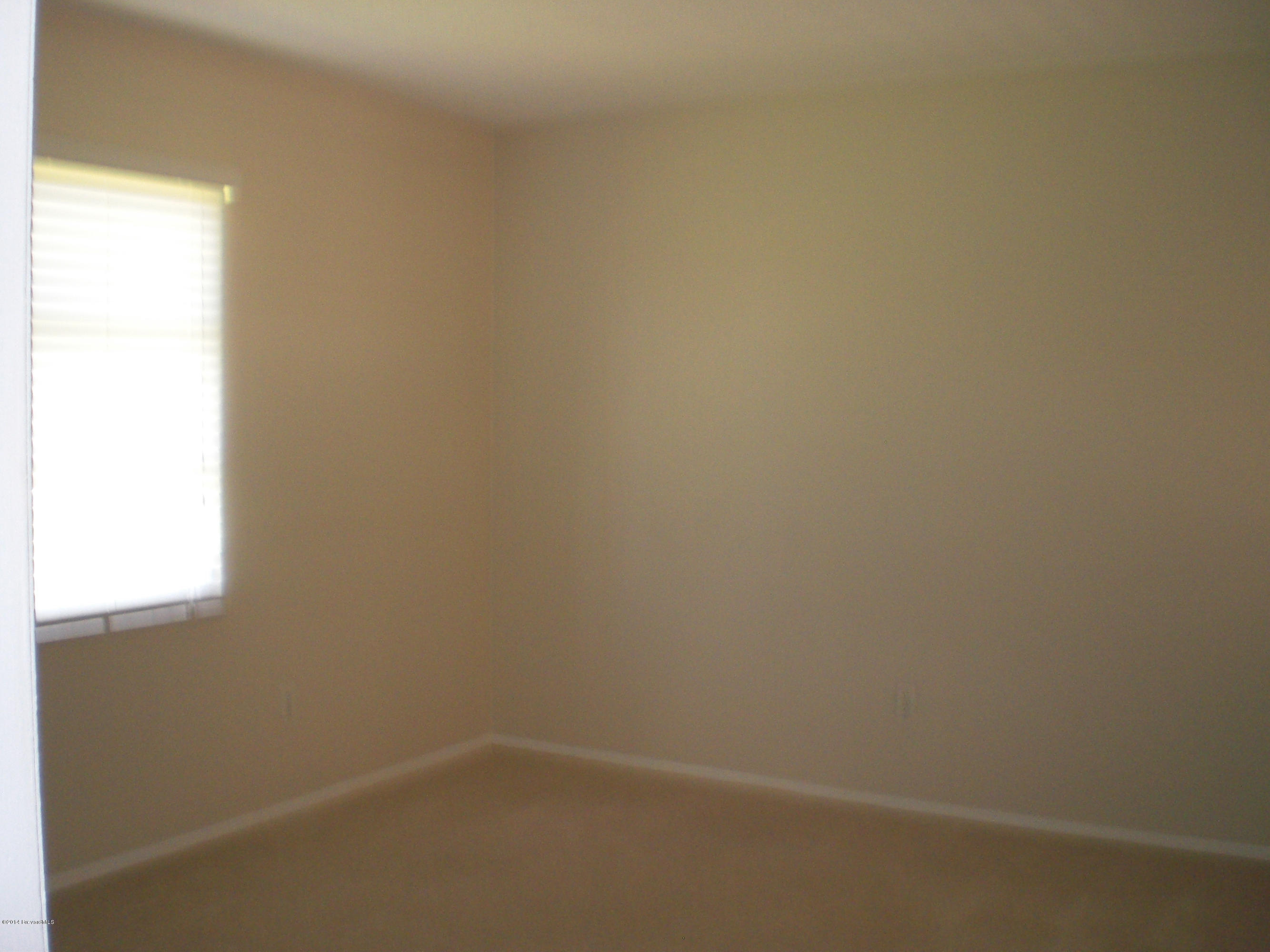 1180 Cotton Road Northeast Palm Bay, FL 32905 - Photo 12 of 18 a small space with a window