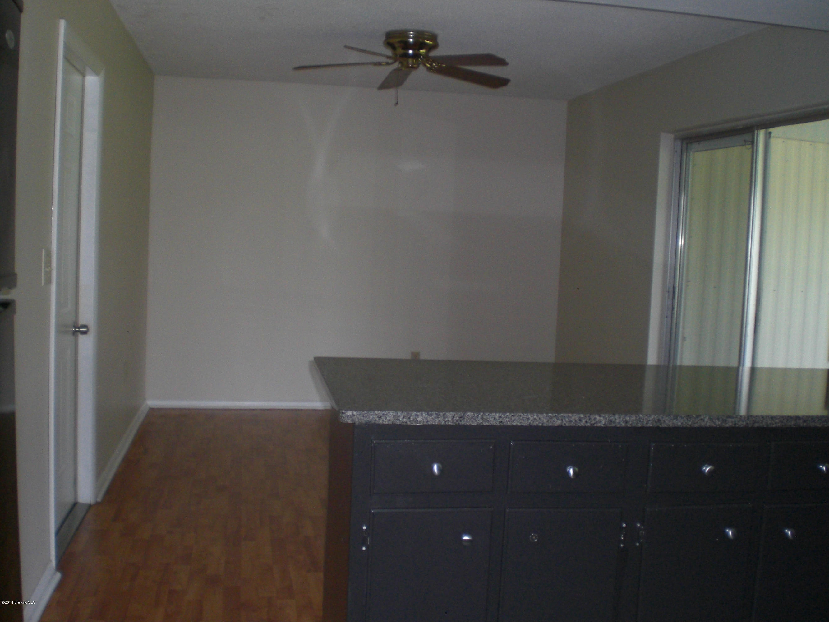 1180 Cotton Road Northeast Palm Bay, FL 32905 - Photo 7 of 18 a view of a cabinets