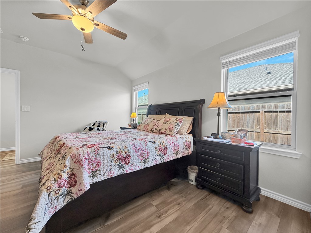 2301 Soothing Street Corpus Christi, TX 78418 - Photo 15 of 25 a bedroom with a bed dresser and a window