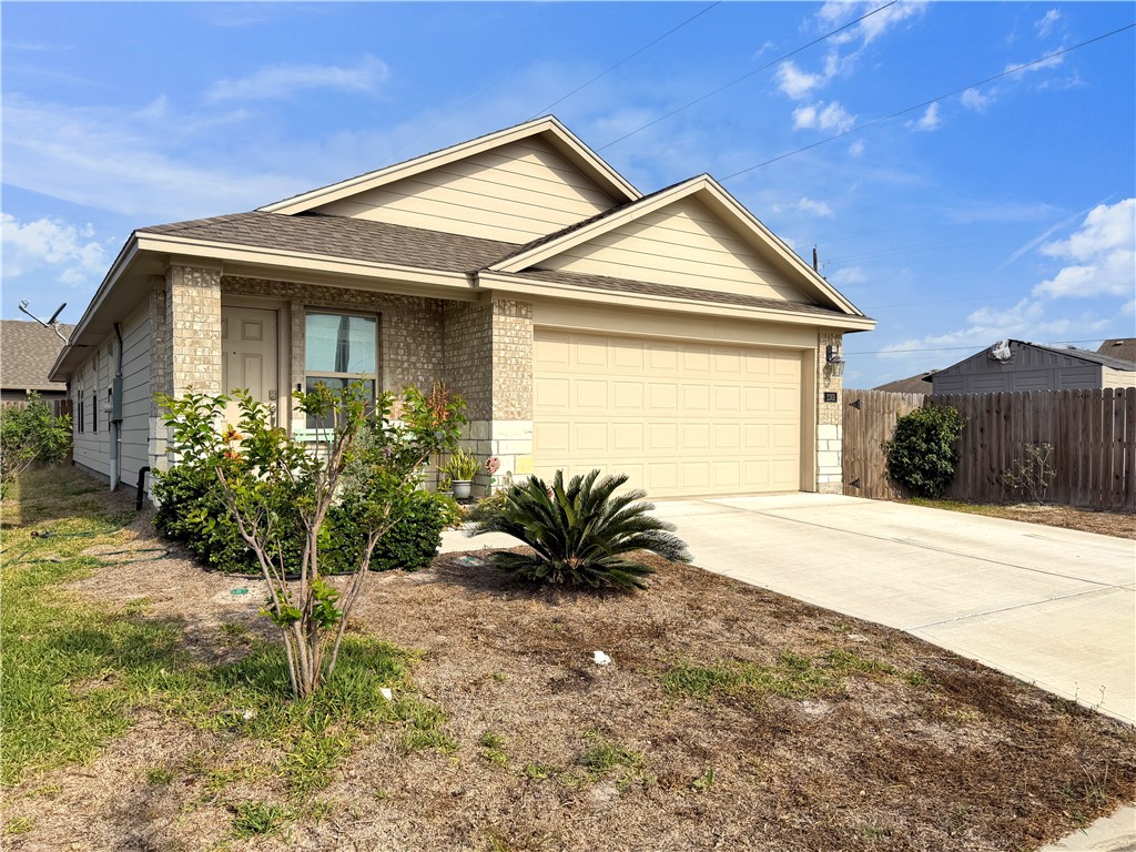 2301 Soothing Street Corpus Christi, TX 78418 - Photo 2 of 25 a view of a house with a yard