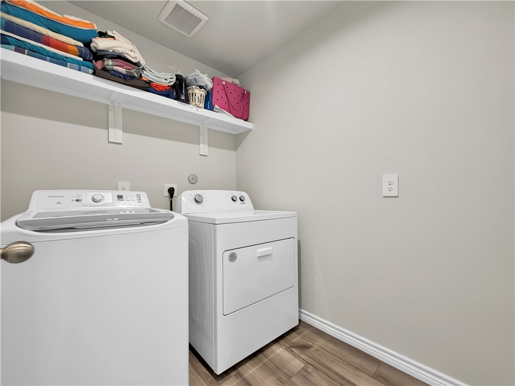 2301 Soothing Street Corpus Christi, TX 78418 - Photo 21 of 25 a utility room with dryer and washer