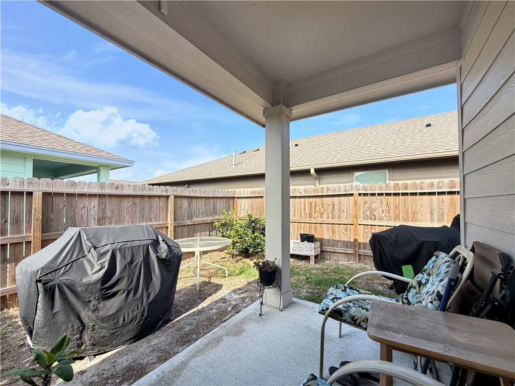 2301 Soothing Street Corpus Christi, TX 78418 - Photo 22 of 25 a living room with furniture a ceiling fan and a window