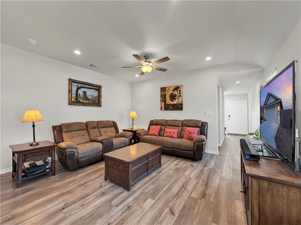 2301 Soothing Street Corpus Christi, TX 78418 - Photo 4 of 25 a living room with furniture and a flat screen tv