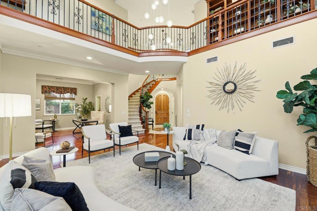 1375 Ravean Court Encinitas, CA 92024 - Photo 11 of 75 a living room with furniture and a large window