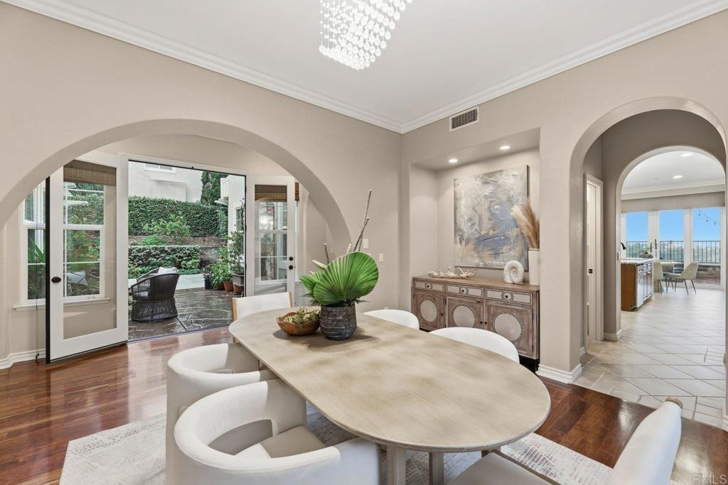 1375 Ravean Court Encinitas, CA 92024 - Photo 28 of 75 a living room with furniture and a large window