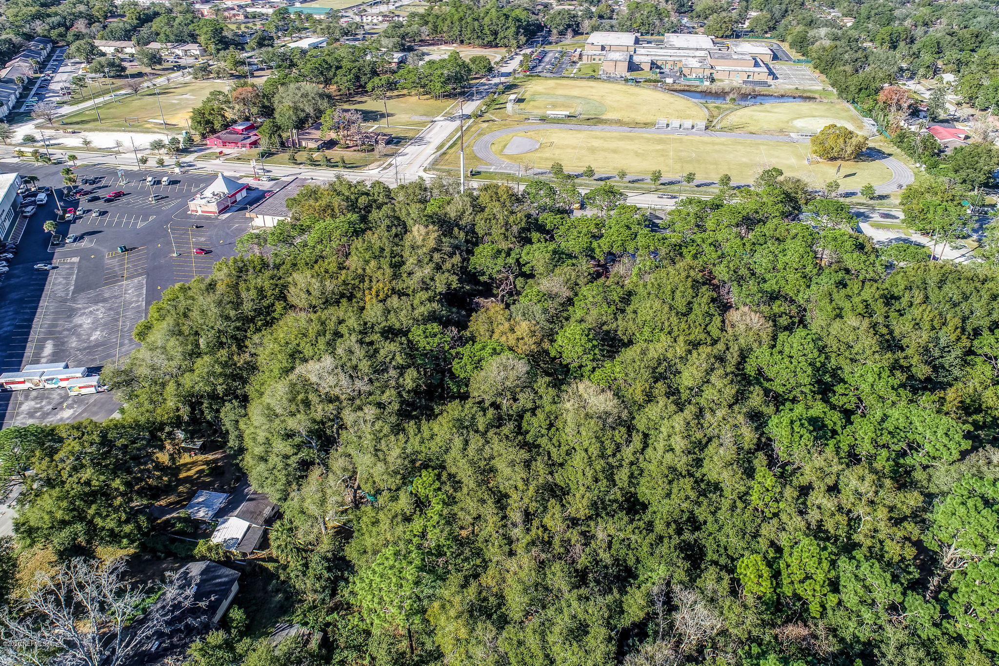 0 Tracy Road Jacksonville, FL 32211 - Photo 5 of 13 a view of a lake with a swimming pool