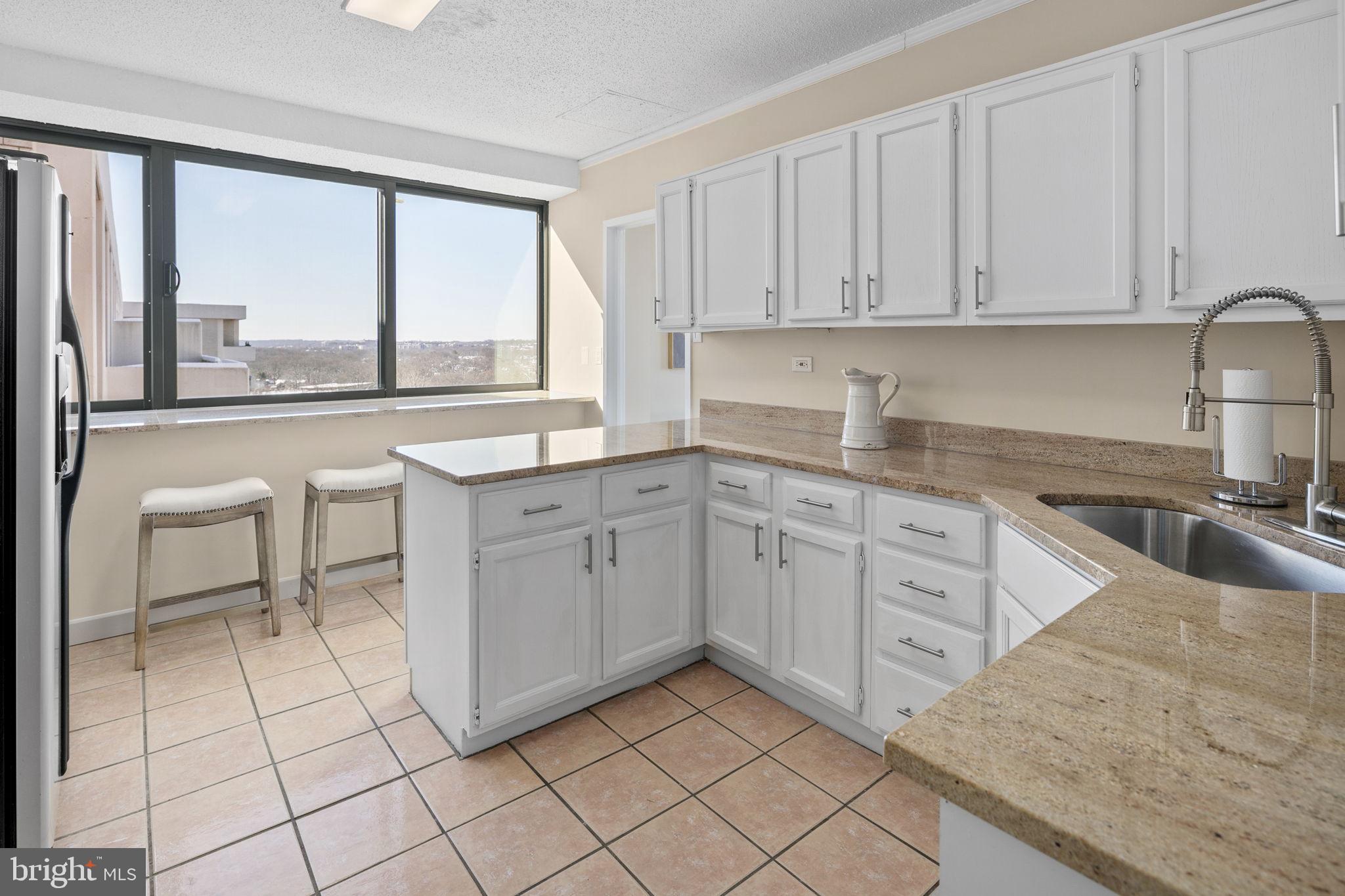 4141 North Henderson Road, Unit 1218 Arlington, VA 22203 - Photo 15 of 50 Enjoy the view from your breakfast bar