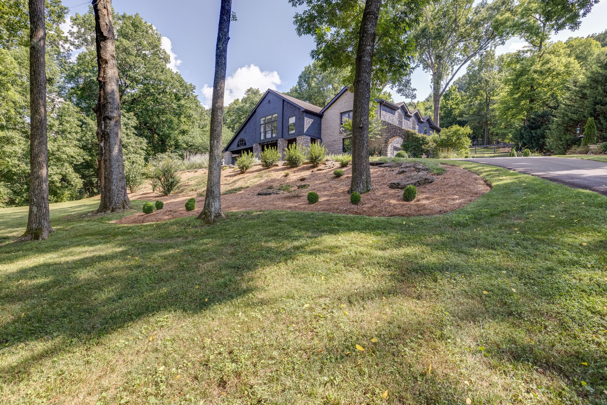 915 Overton Lea Road Nashville, TN 37220 - Photo 2 of 47 a view of a house with a yard