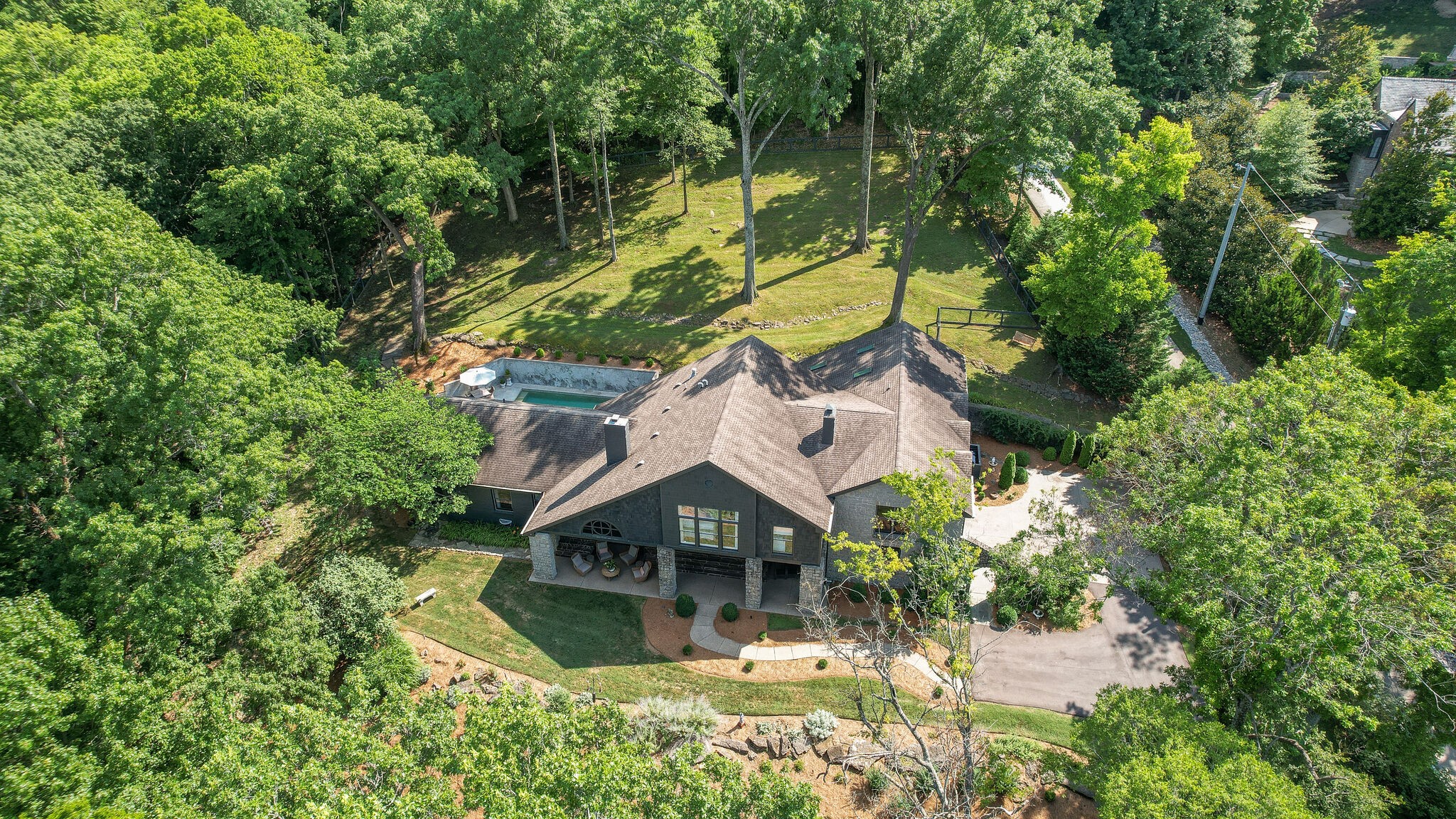 915 Overton Lea Road Nashville, TN 37220 - Photo 42 of 47 an aerial view of house with yard swimming pool and outdoor seating