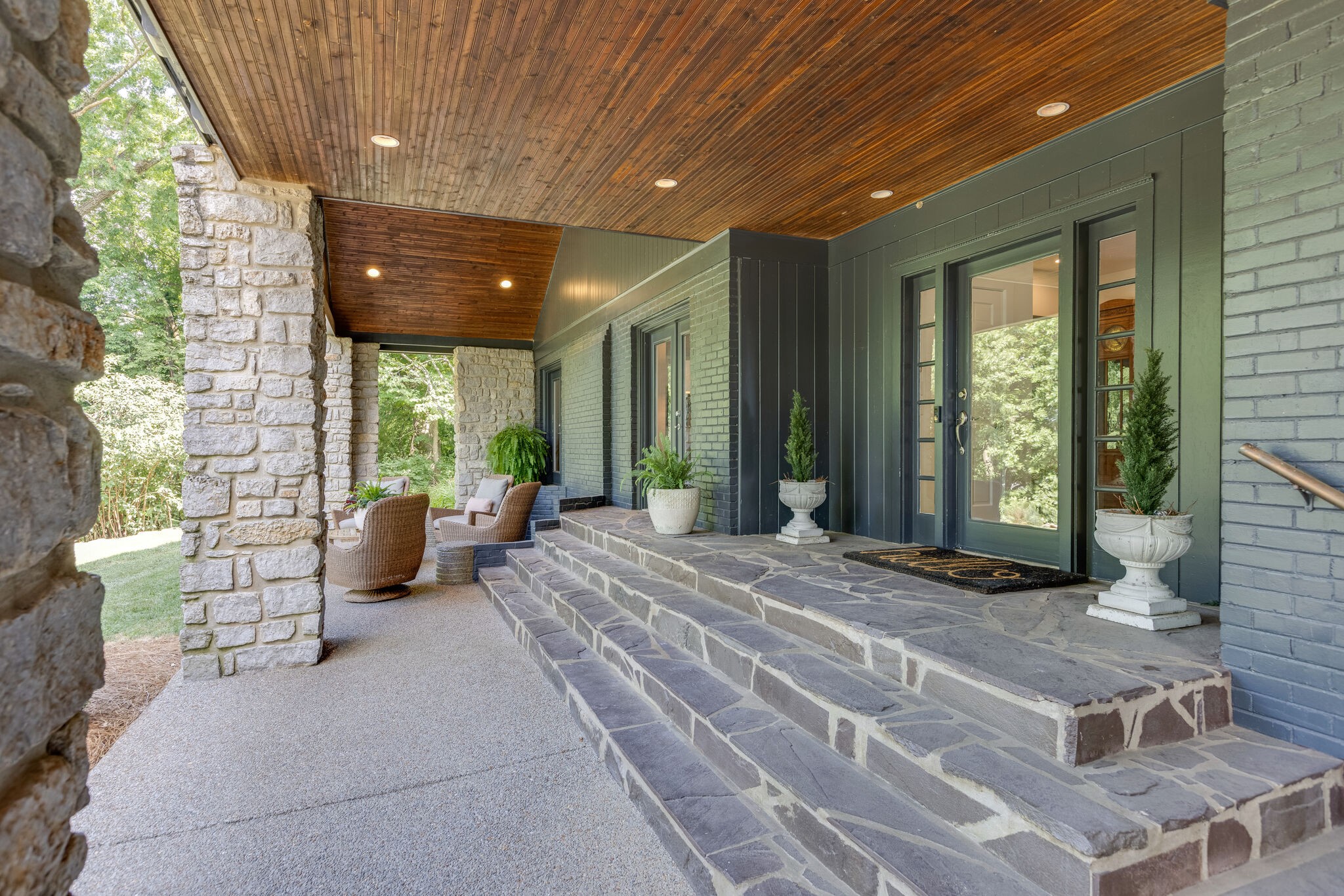 915 Overton Lea Road Nashville, TN 37220 - Photo 6 of 47 a spacious bedroom with a large window and a potted plant