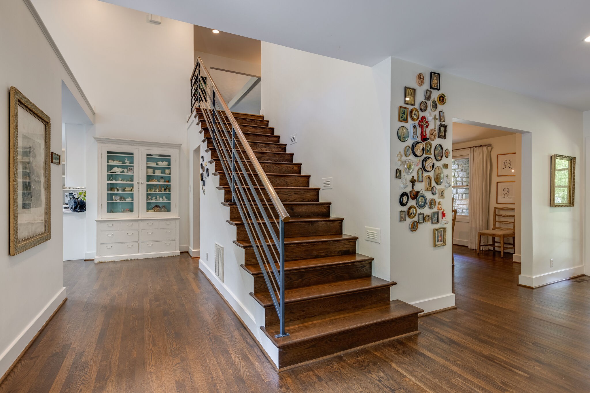 915 Overton Lea Road Nashville, TN 37220 - Photo 8 of 47 a view of entryway with wooden floor and stairs