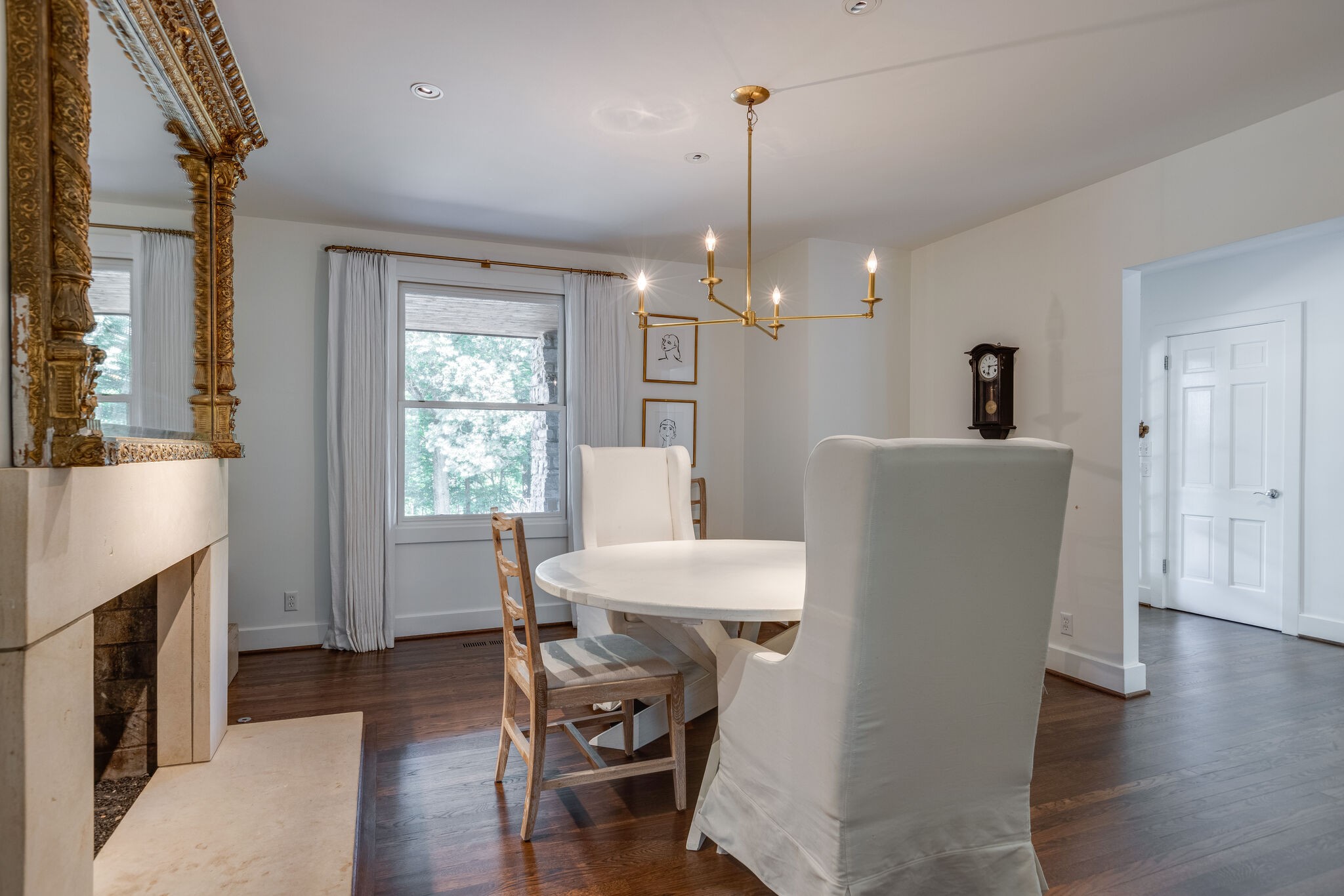915 Overton Lea Road Nashville, TN 37220 - Photo 10 of 47 a view of a dining room with furniture window and wooden floor