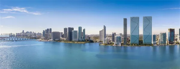 a view of a city with tall buildings
