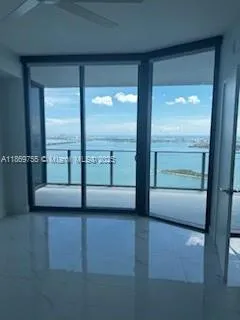 a view of front door with a view of room