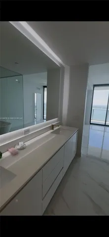 a living room with a bed