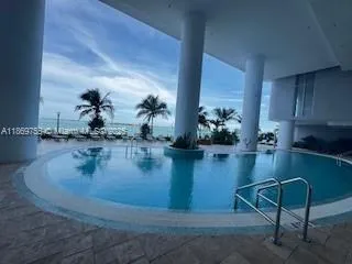 a view of a dining room with hardwood floor