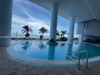 700 Northeast 24th Street, Unit 2206 Miami, FL 33137 - Photo 4 of 41 a view of a dining room with hardwood floor