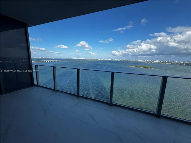 a view of a livingroom with furniture and chandelier