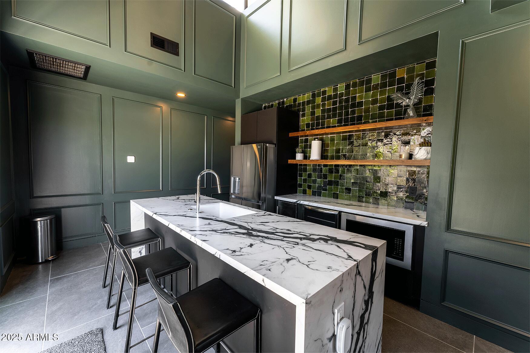 4334 East Lewis Avenue Phoenix, AZ 85008 - Photo 9 of 26 a view of a dining table with chairs
