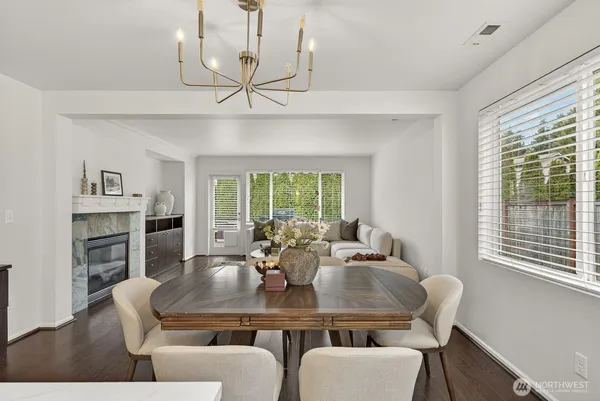 a view of a dining room with furniture window and outside view