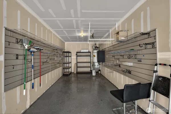 a view of an empty room with a staircase