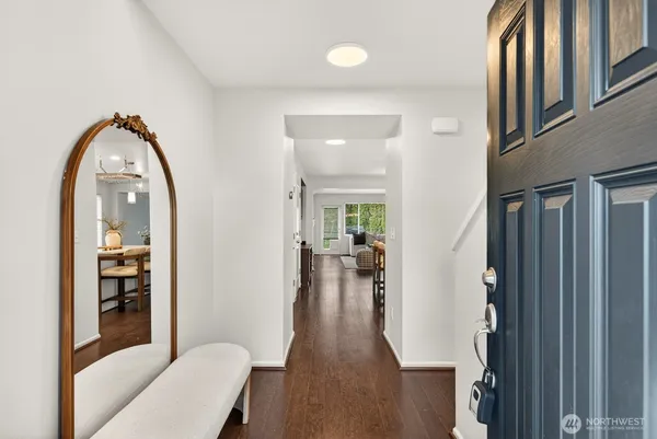 a view of livingroom with furniture and wooden floor