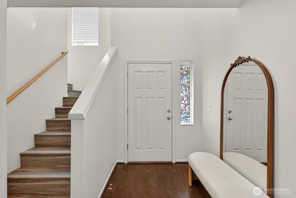 a view of an entryway with staircase