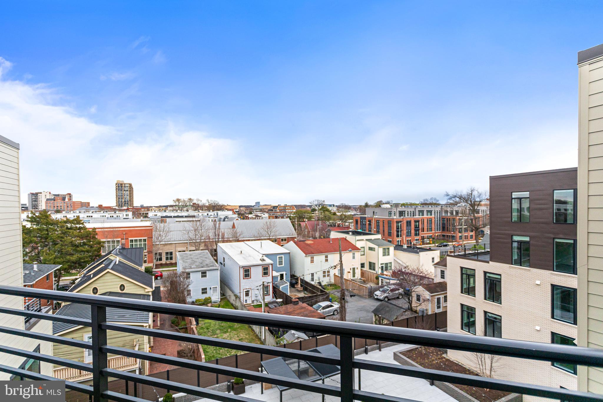 701 North Henry Street, Unit 204 Alexandria, VA 22314 - Photo 6 of 12 a view of a balcony with city view
