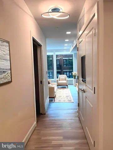 a view of a living room with a flat screen tv