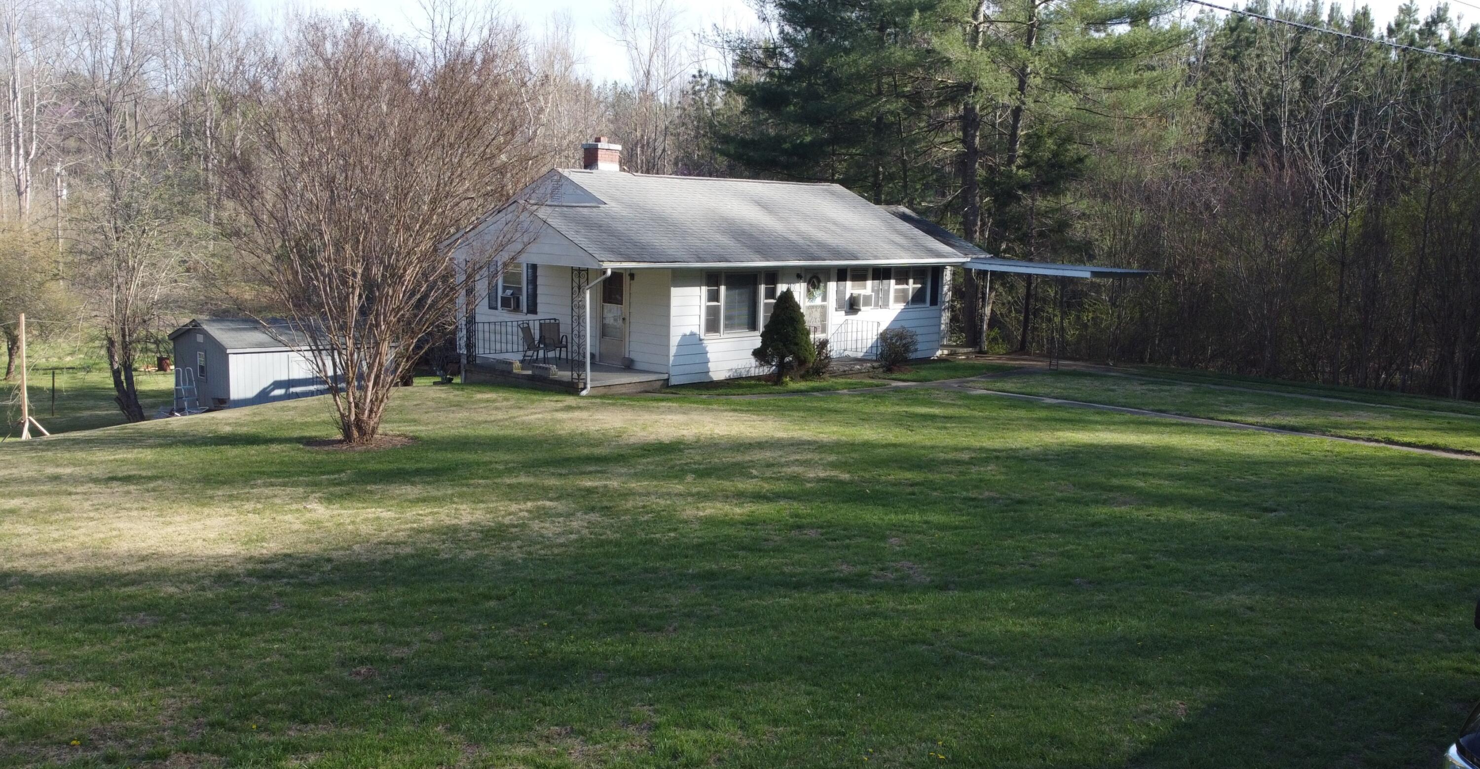 8180 Chatham Road Martinsville, VA 24112 - Photo 2 of 22 a view of a house with a yard