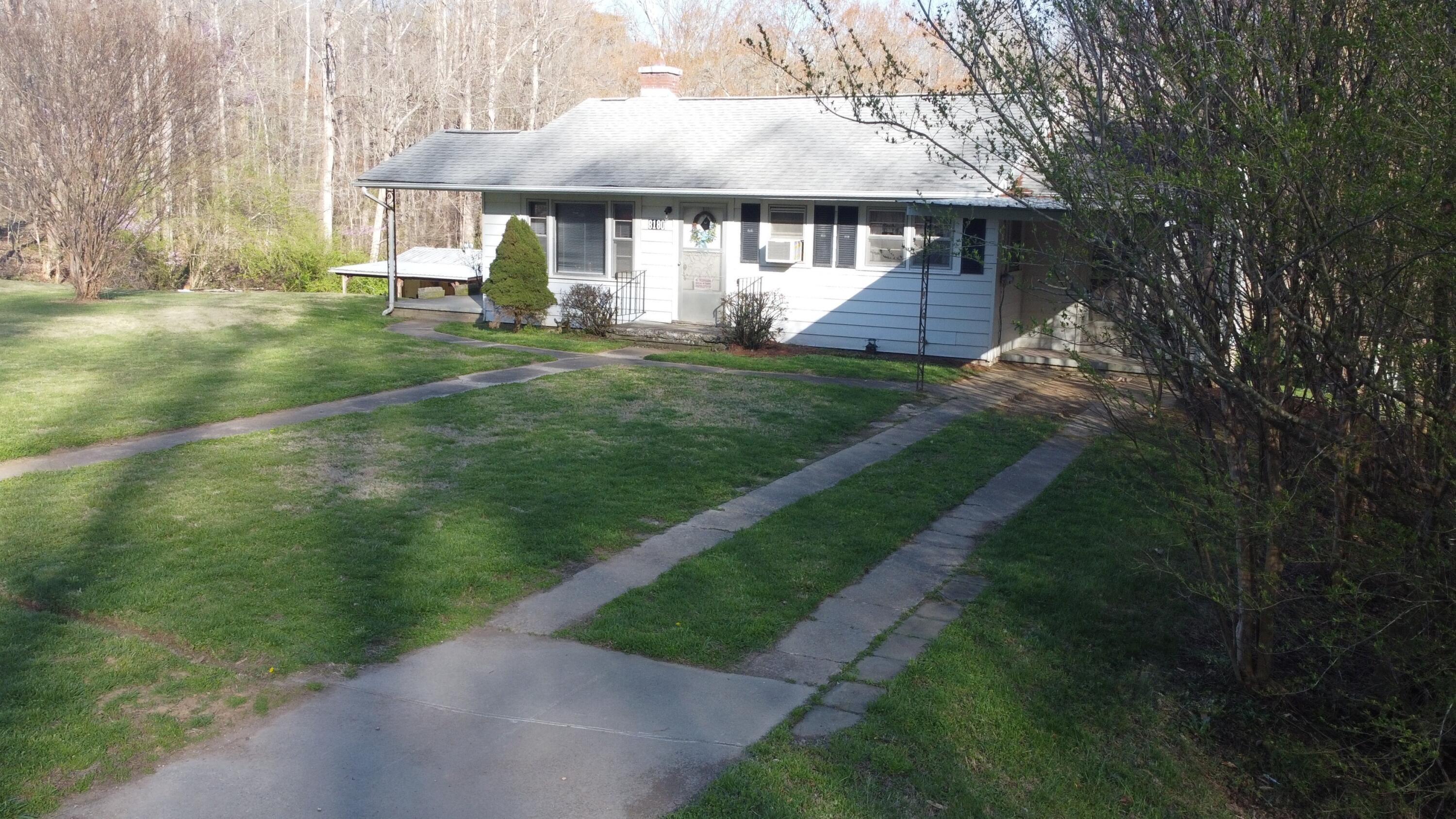 8180 Chatham Road Martinsville, VA 24112 - Photo 22 of 22 a view of a house with a yard