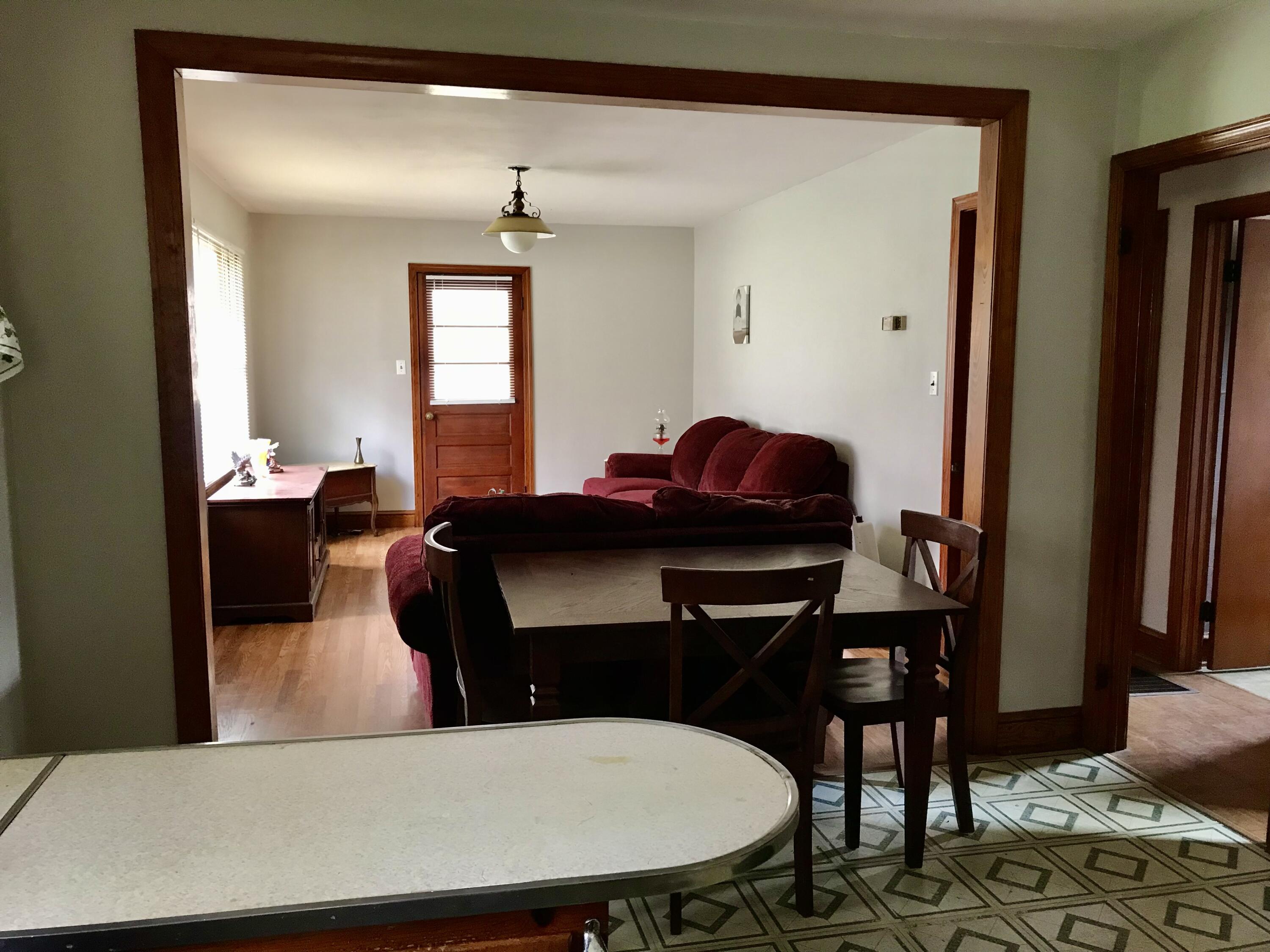 8180 Chatham Road Martinsville, VA 24112 - Photo 8 of 22 a living room with furniture and wooden floor