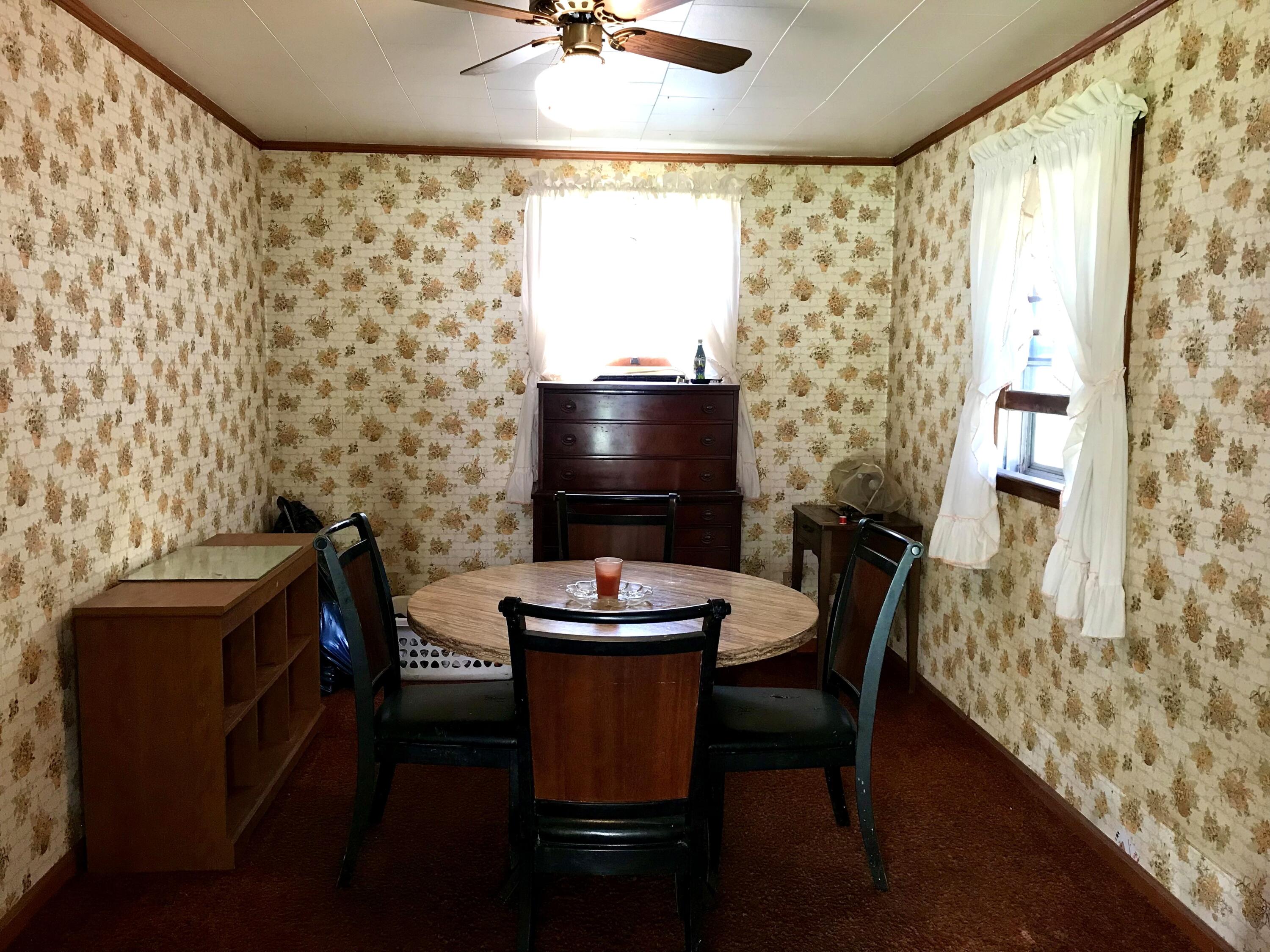 8180 Chatham Road Martinsville, VA 24112 - Photo 9 of 22 a dining room with furniture and window