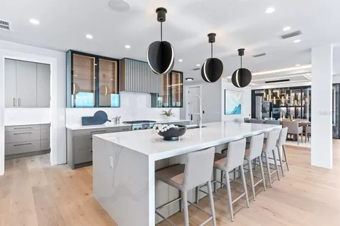 a large kitchen with a large counter space