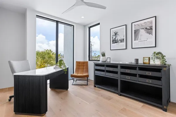 a bathroom with a shower and a sink
