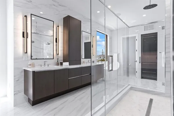 a large en suite bathroom with a tub and shower