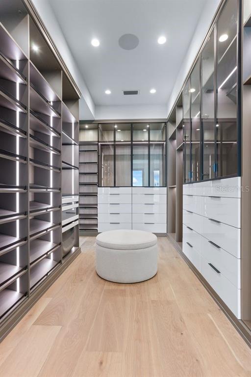 445 129th Avenue East Madeira Beach, FL 33708 - Photo 28 of 72 a bathroom with a large tub and shower